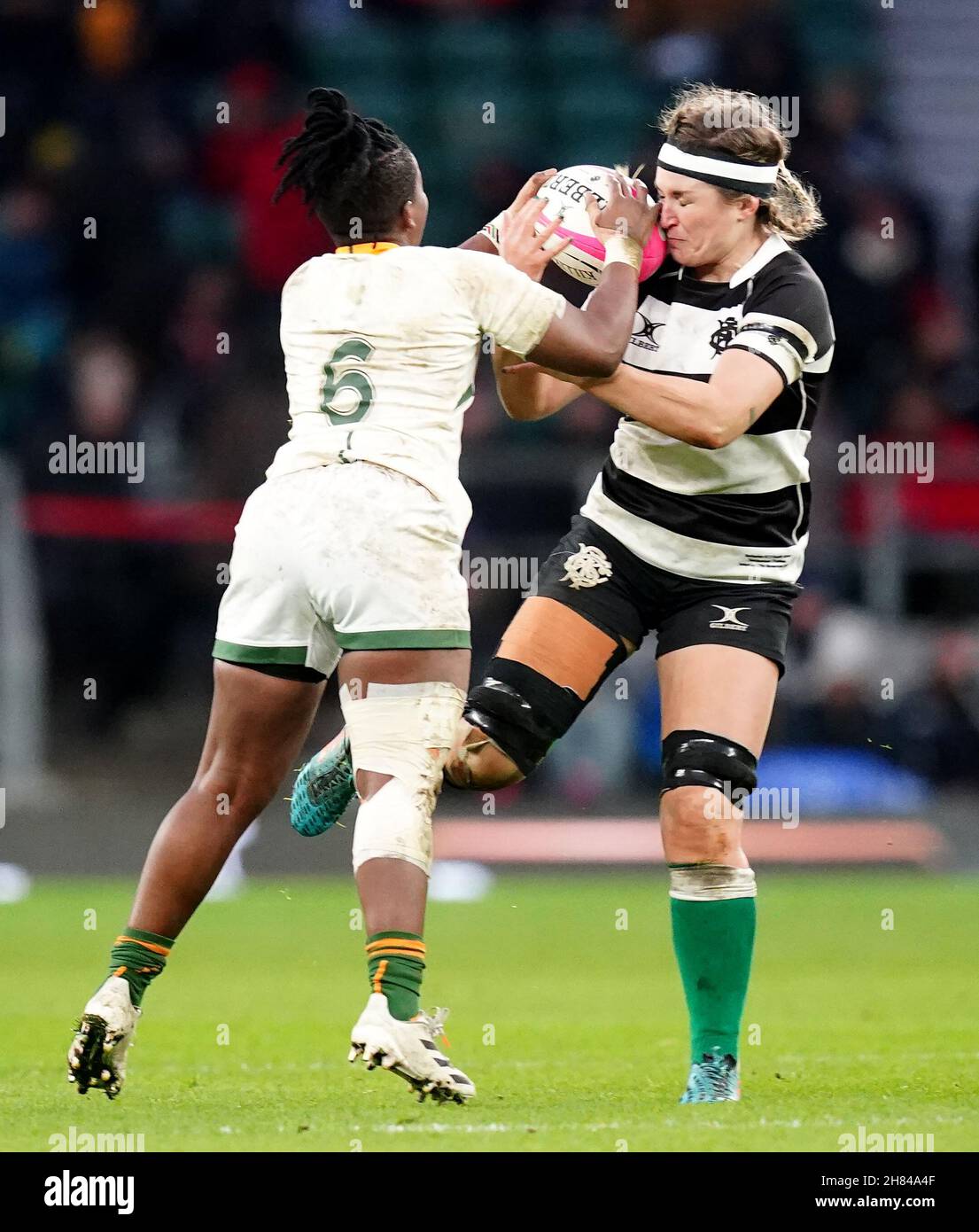 South Africa's Lusanda Dumke (left) and Barbarians' Anna Caplice in action during the Autumn International match at Twickenham Stadium, London. Picture date: Saturday November 27, 2021. See PA story RUGBYU Barbarian Women. Photo credit should read: David Davies/PA Wire. RESTRICTIONS: Use subject to restrictions. Editorial use only, no commercial use without prior consent from rights holder. Stock Photo