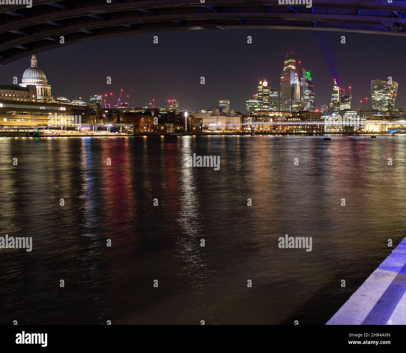 A view of the city of London skyline at night showing station Pauls cathedral, the wale talkie and the cheesgrater. Stock Photo