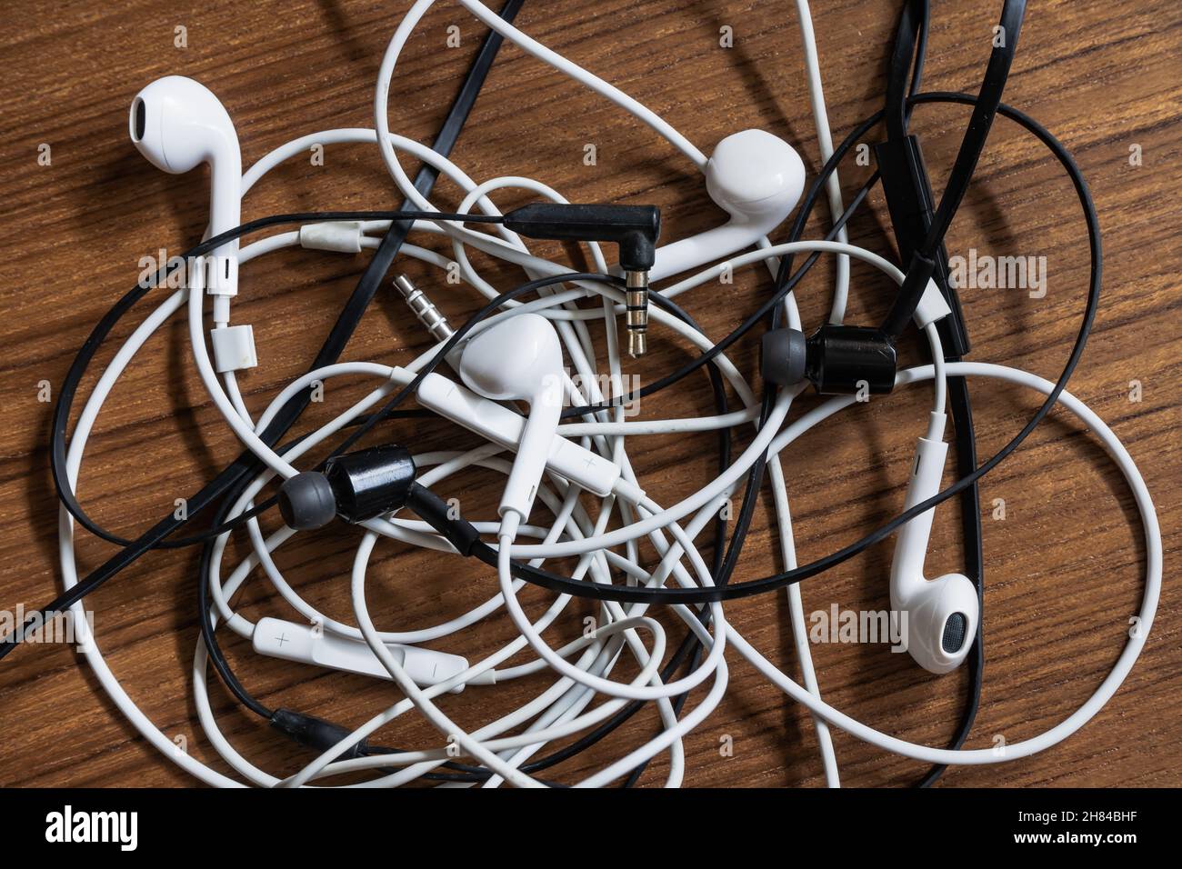 Earphones tangle hi-res stock photography and images - Alamy