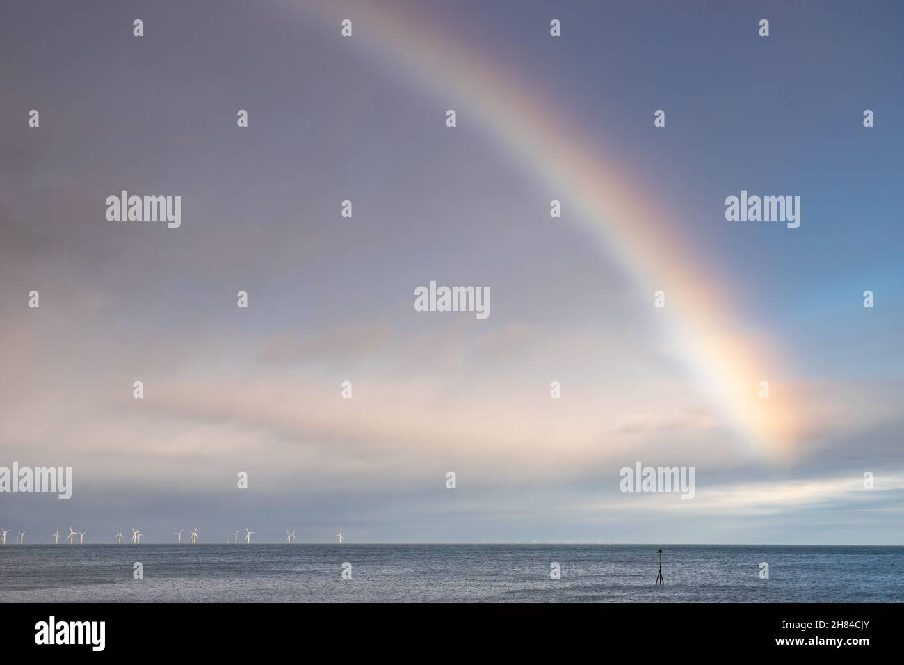 Rainbow over the Gwynt-y-Môr offshore wind farm in Colwyn Bay, North ...