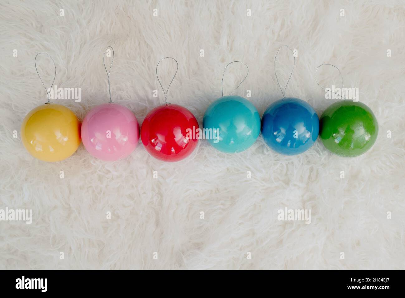 Rainbow Large Plastic Christmas Bulbs on White Fur Background Stock Photo Alamy