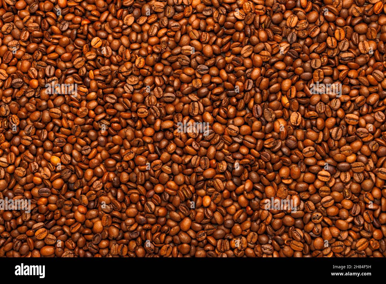 full frame background and texture of roasted coffee beans on flat ...