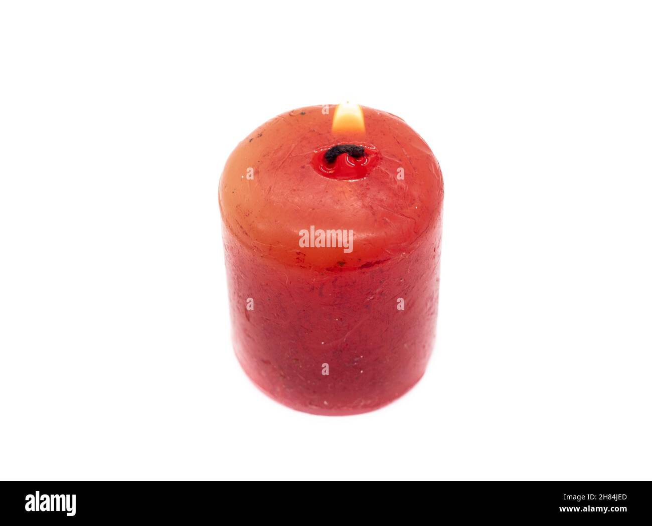 burning red candle isolated on white background Stock Photo Alamy