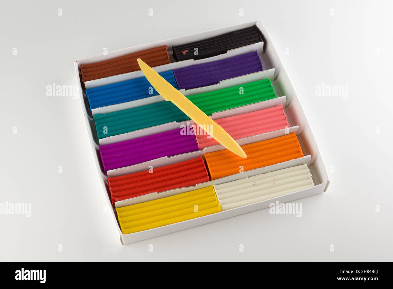 children color wax plasticine for creativity isolated on a white