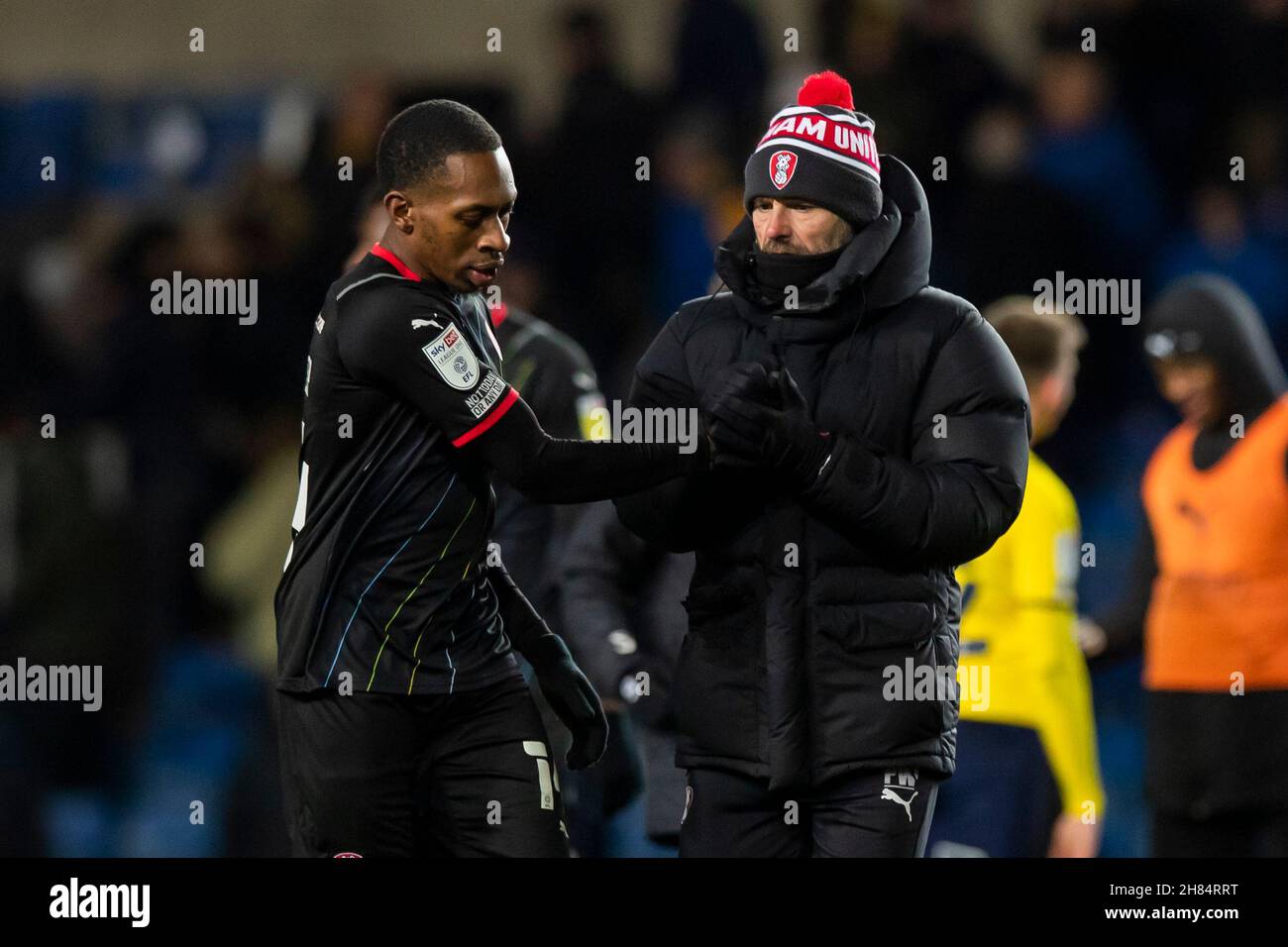 Rotherham United's Mickel Miller (left) embraces manager Paul Warne after the final whistle of the Sky Bet League One match at the Kassam Stadium, Oxford. Picture date: Saturday November 27, 2021. Stock Photo