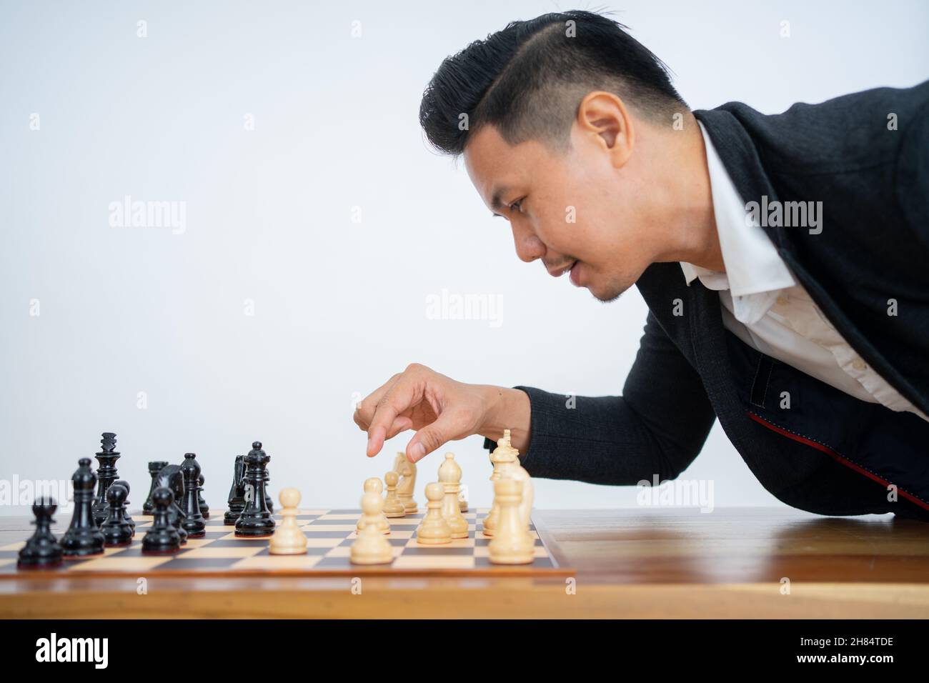 Man playing chess. Play with God or with yourself. Concept - strategy  goals, efforts, plans. Stock Photo