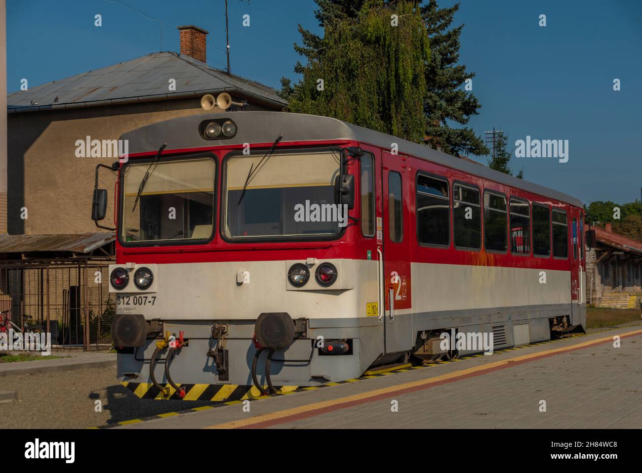 Station with train in Rimavska Sobota town in summer hot color blue sky morning Stock Photo