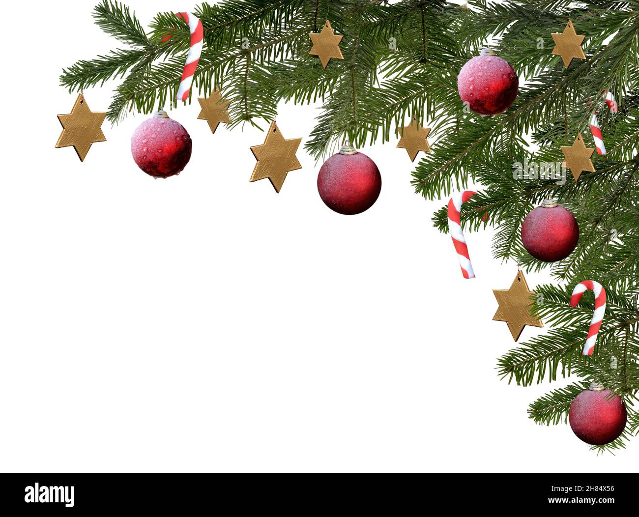 christmas tree branch isolated with red balls and stars Stock Photo