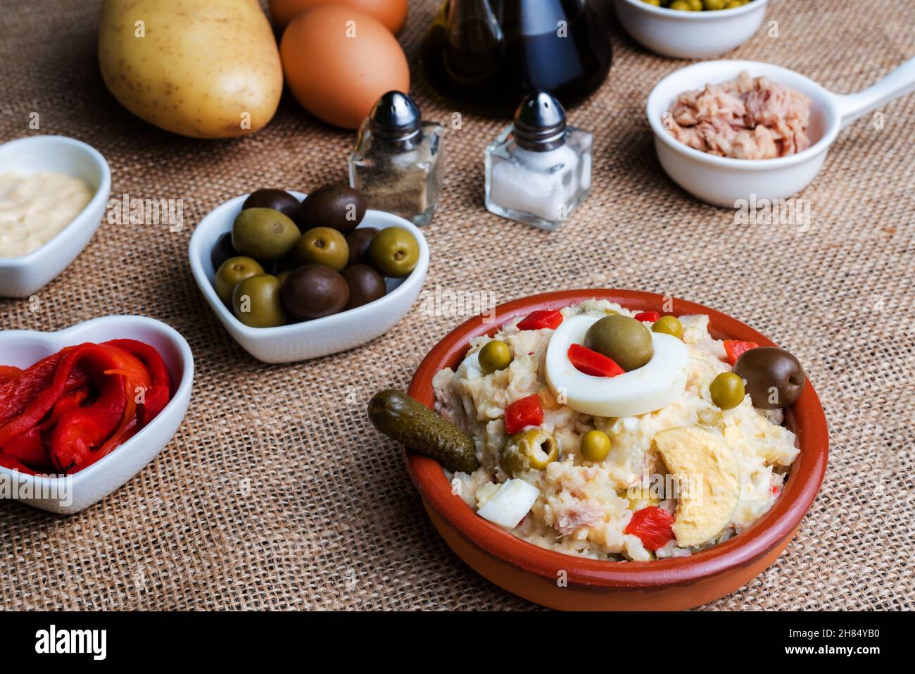 Spanish style Russian salad, also known as Olivier salad,