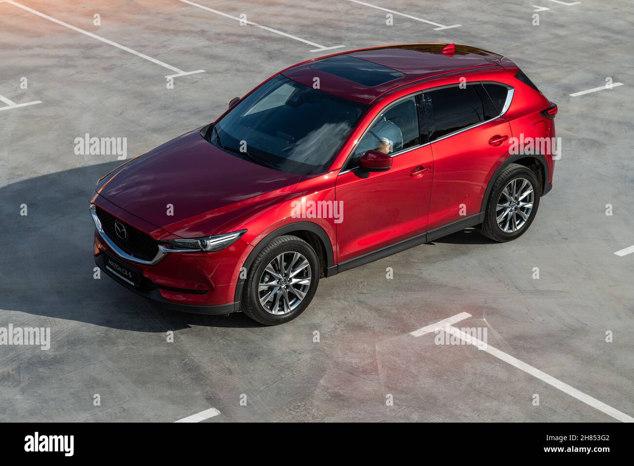Kyiv, Ukraine - June 30, 2021: Red Mazda CX-5 at parking lot in the city Stock Photo