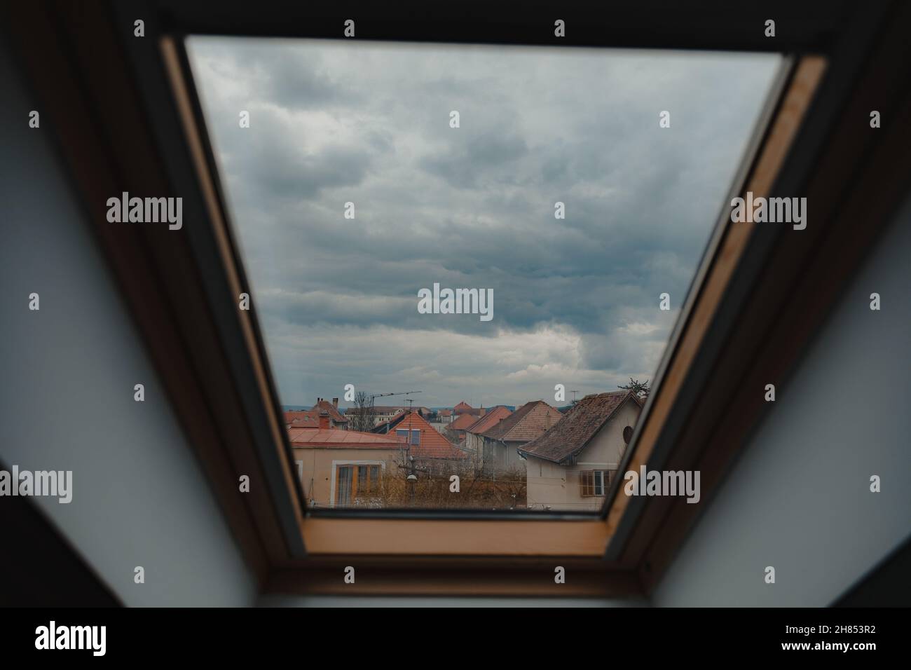 Low angle shot of a window with buildings seen through it Stock Photo ...