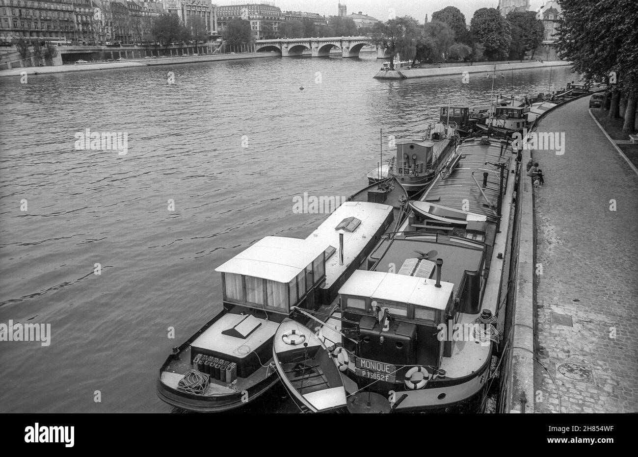 April 1993 archive black & white photograph of barges on the Seine in the centre of Paris. Stock Photo
