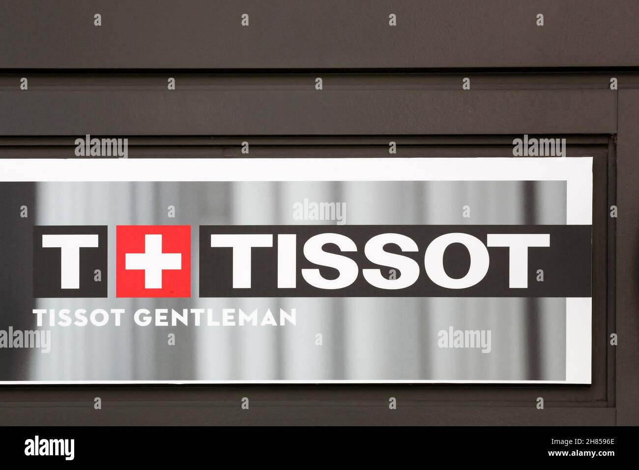 Villefranche, France - May 15, 2020: Tissot logo on a wall. Tissot is a Swiss watchmaker and the company was founded in Le Locle, Switzerland Stock Photo