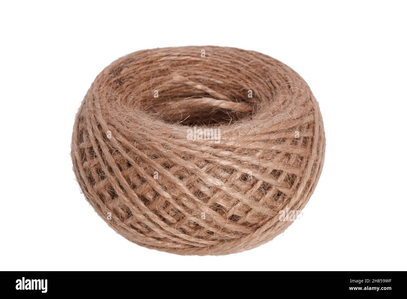 a tangle of jute string in isolation on a white background. High
