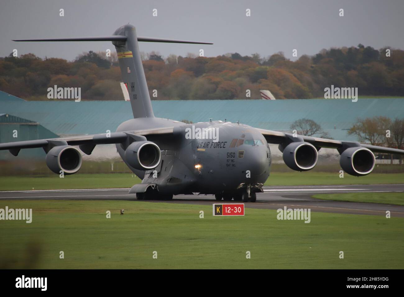 05-5150, a Boeing C-17A Globemaster III operated by the United States Air Force in a strategic airlift role, at Prestwick International Airport in Ayrshire, Scotland. The aircraft is jointly operated by the 15th Wing and the 154th Wing of the Hawaii Air National Guard, based at Hickam Air Force Base in Hawaii. Stock Photo