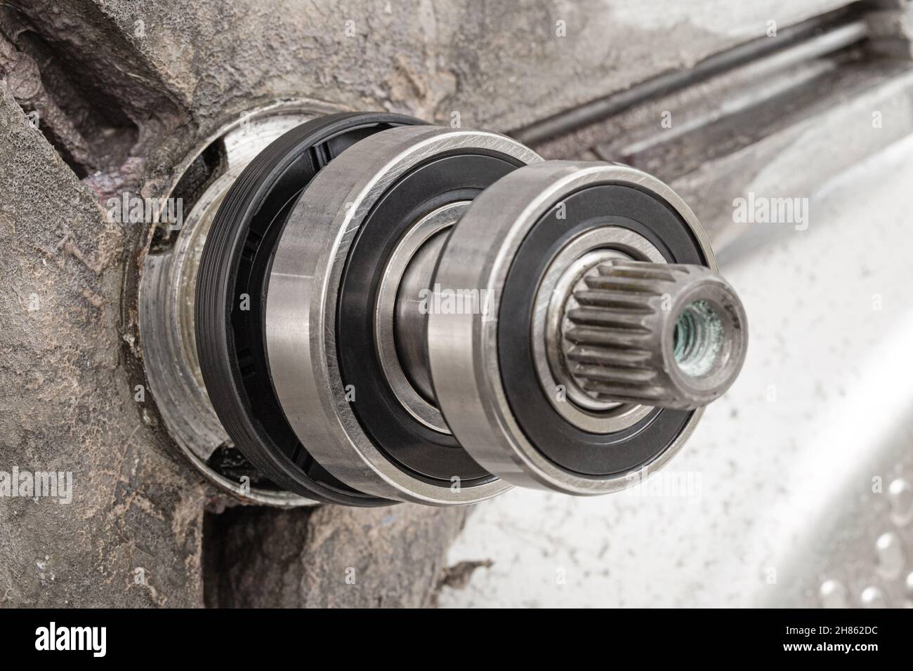 Replacing bearings and shaft cuffs on the washing machine drum Stock Photo  - Alamy