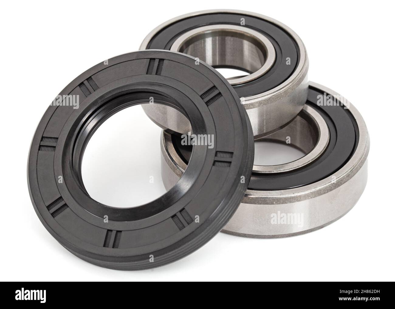 Ball bearings and oil seal, isolated on white background Stock Photo