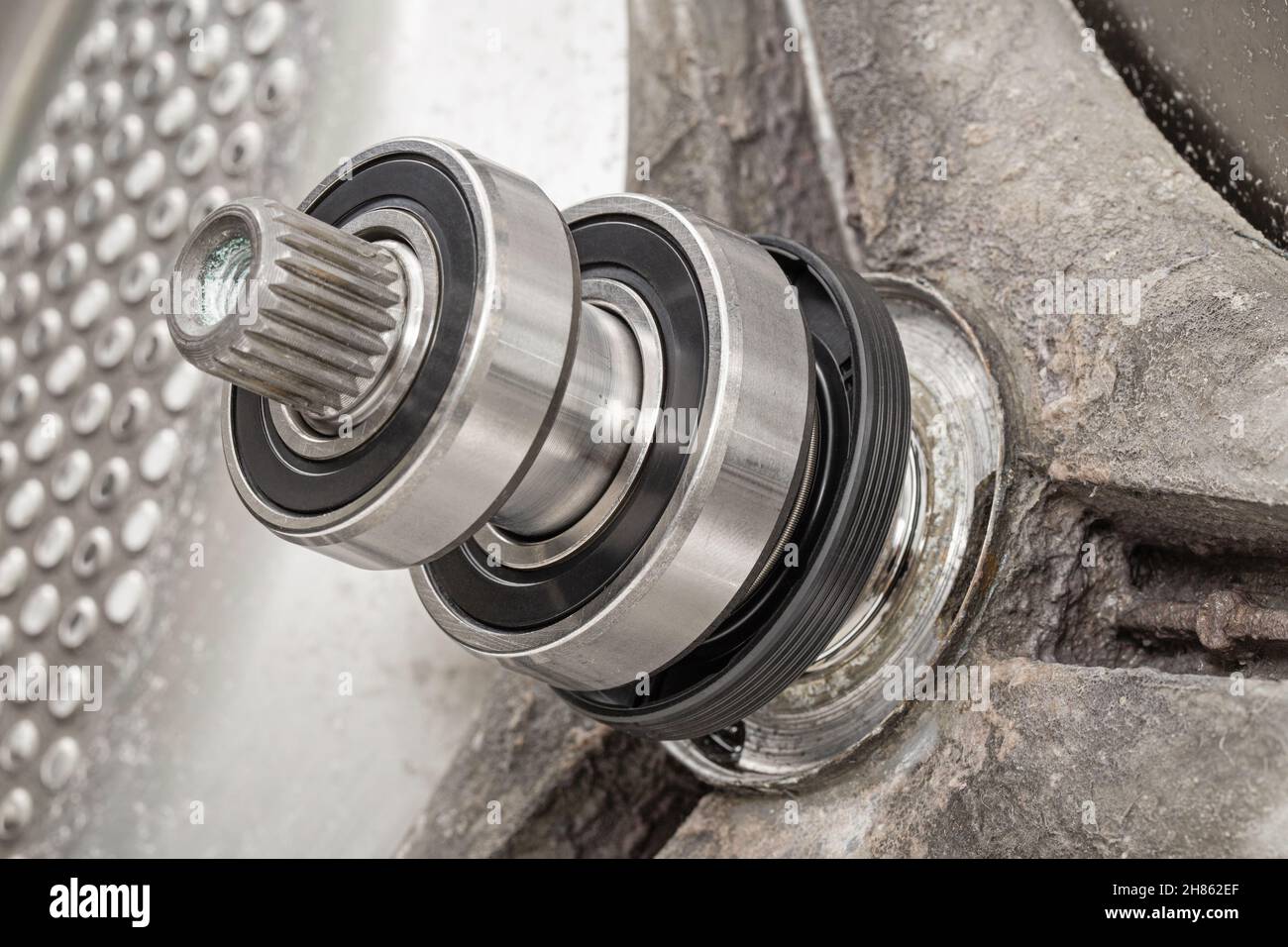 Replacing bearings and shaft cuffs on the washing machine drum Stock