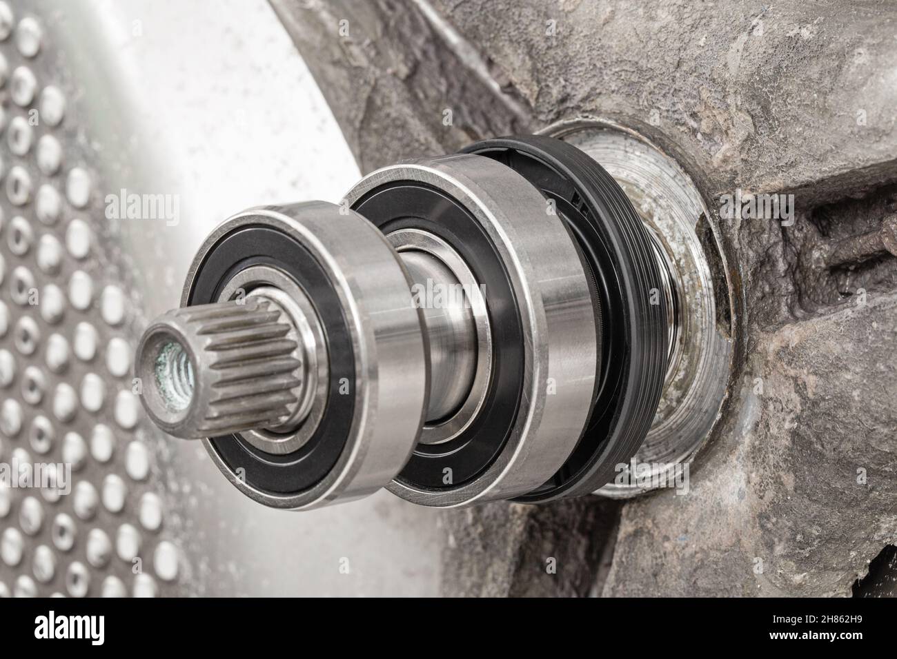 Replacing bearings and shaft cuffs on the washing machine drum Stock Photo Alamy