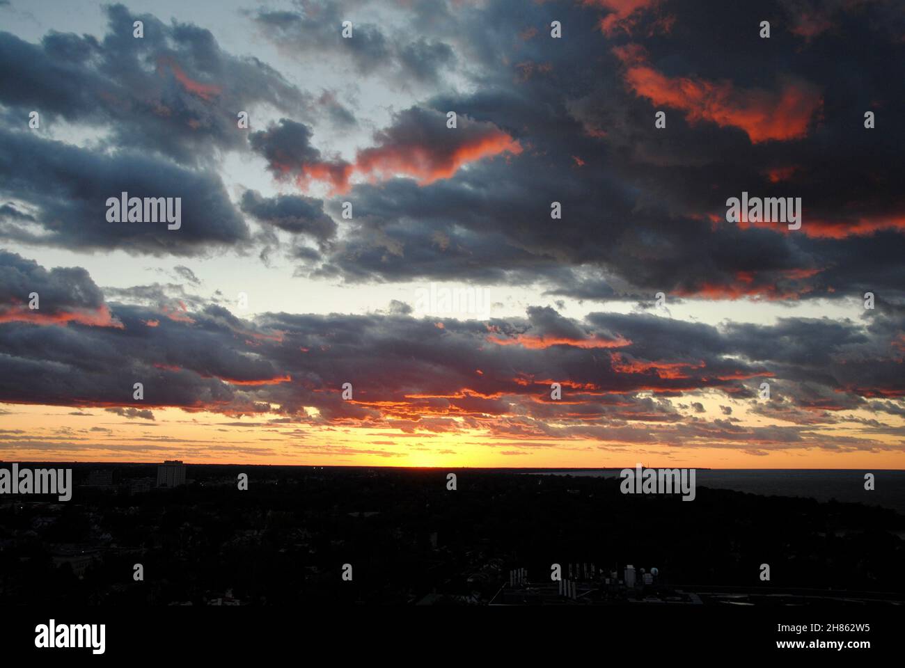Dramatic and colorful sunset over Lake Erie at Lakewood/Cleveland area Stock Photo