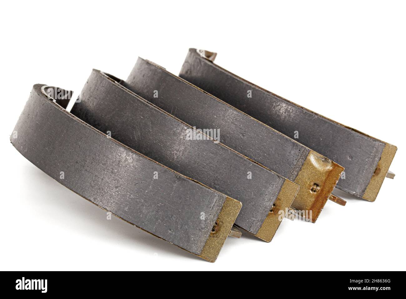 Set of asbestos brake pads, replacement spare parts of the car brake system, isolated on white