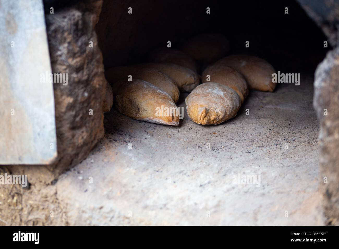 Natural bread cooked in an old oven on a stone Stock Photo Alamy