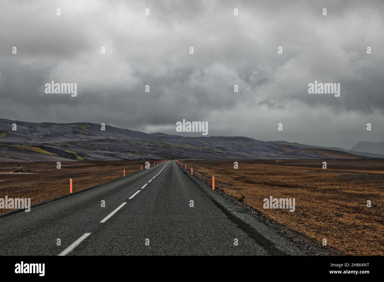 A long road on a stormy day in rural Iceland Stock Photo - Alamy