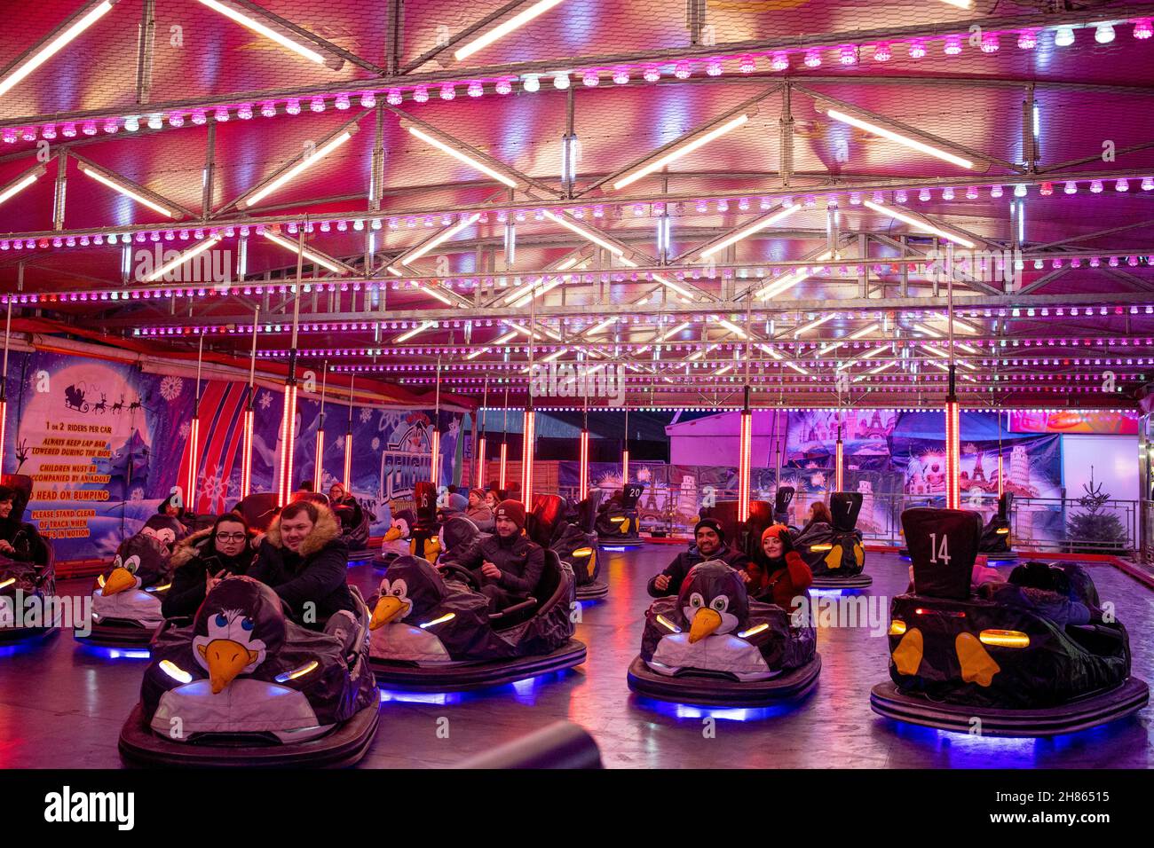 London, UK. 27th Nov, 2021. People are seen playing bumper cars in