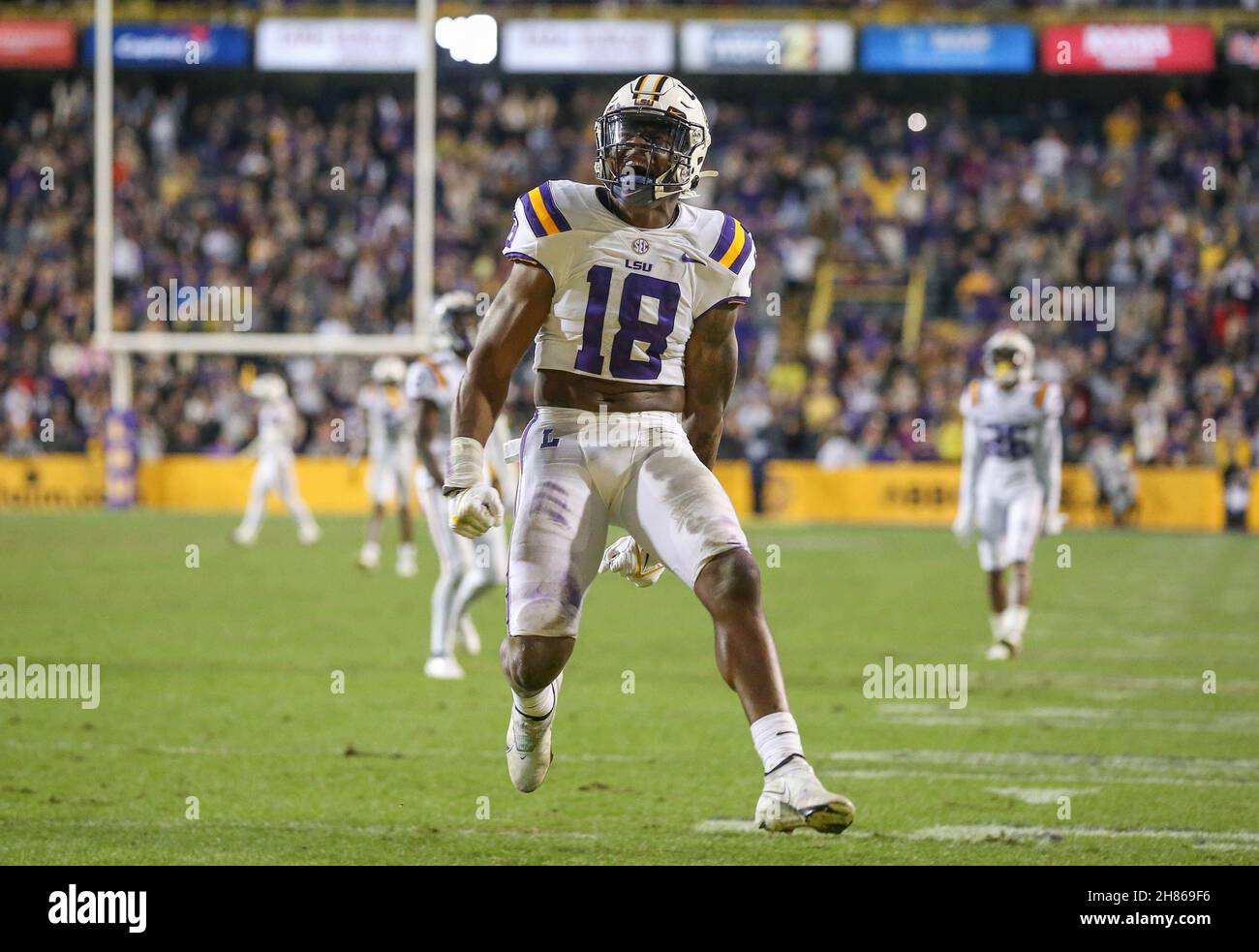 Baton Rouge, LA, USA. 27th Nov, 2021. LSU linebacker Damone Clark (18) celebrates after a sack in the closing seconds during NCAA football game action between the Texas A&M Aggies and the LSU Tigers at Tiger Stadium in Baton Rouge, LA. Jonathan Mailhes/CSM/Alamy Live News Stock Photo