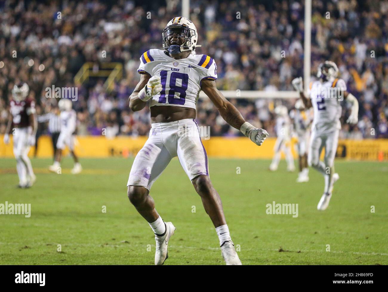Baton Rouge, LA, USA. 27th Nov, 2021. LSU linebacker Damone Clark (18) celebrates after a sack in the closing seconds during NCAA football game action between the Texas A&M Aggies and the LSU Tigers at Tiger Stadium in Baton Rouge, LA. Jonathan Mailhes/CSM/Alamy Live News Stock Photo