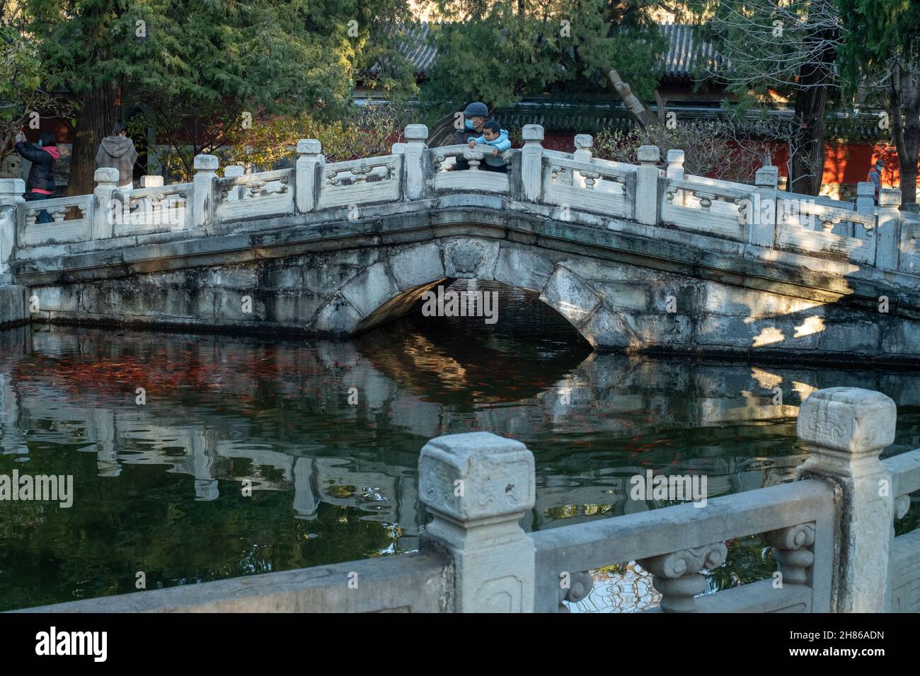 Arch Bridge in Reclining Buddha (Wofo) Temple in Beijing Botanical Garden Stock Photo