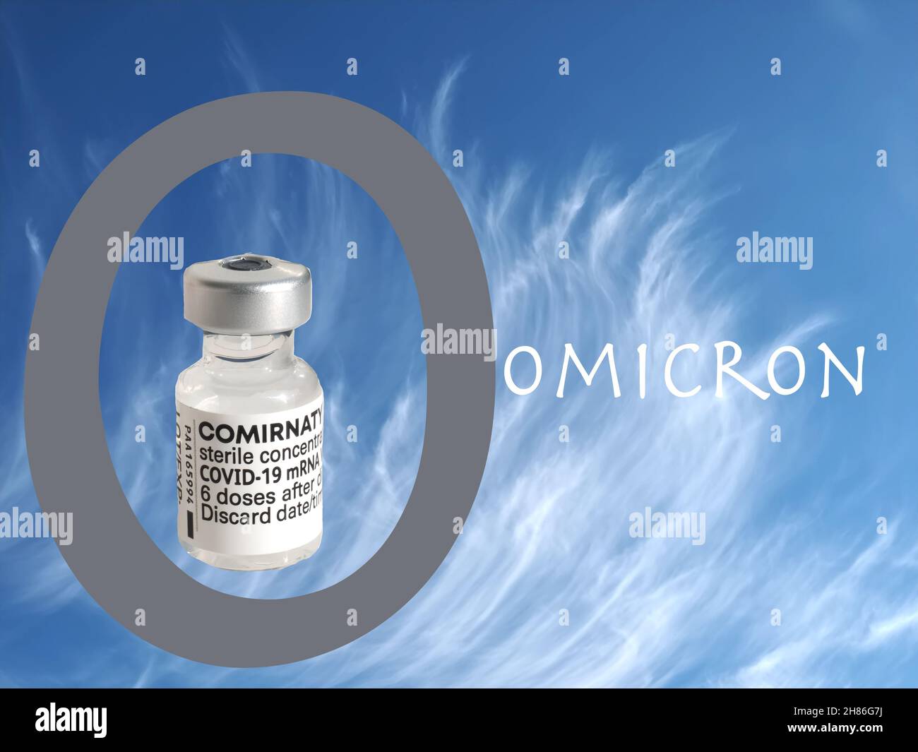 Omicron symbol with Biontech Pfizer Vaccine Stock Photo