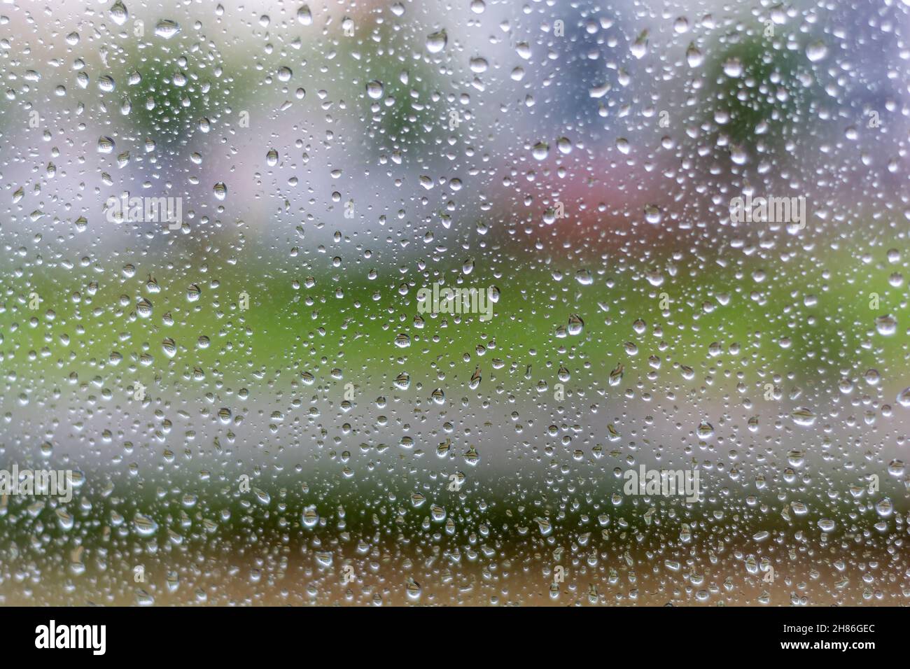 The drops of water on a glass in a rainy day Stock Photo - Alamy
