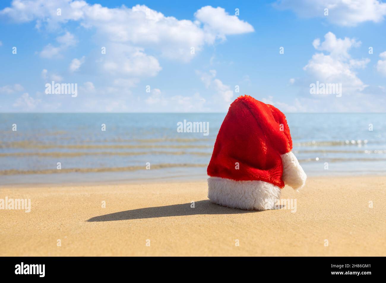 santa claus on the beach new year happy Stock Photo - Alamy