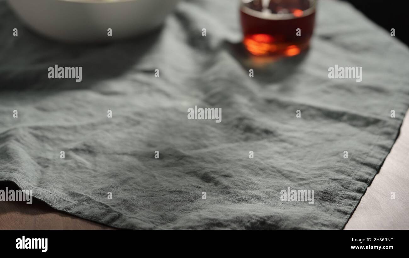 Linen cloth with bowl and glass with copy space, shallow focus Stock ...
