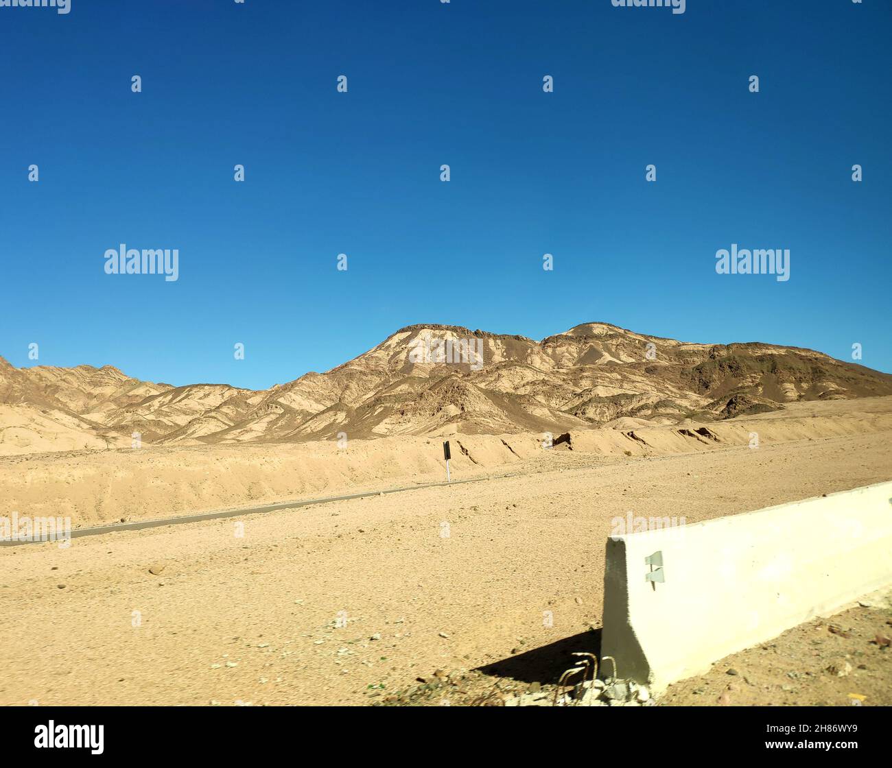Border line in the desert, picturesque background with mountains and hills, desert landscape wallpaper Stock Photo