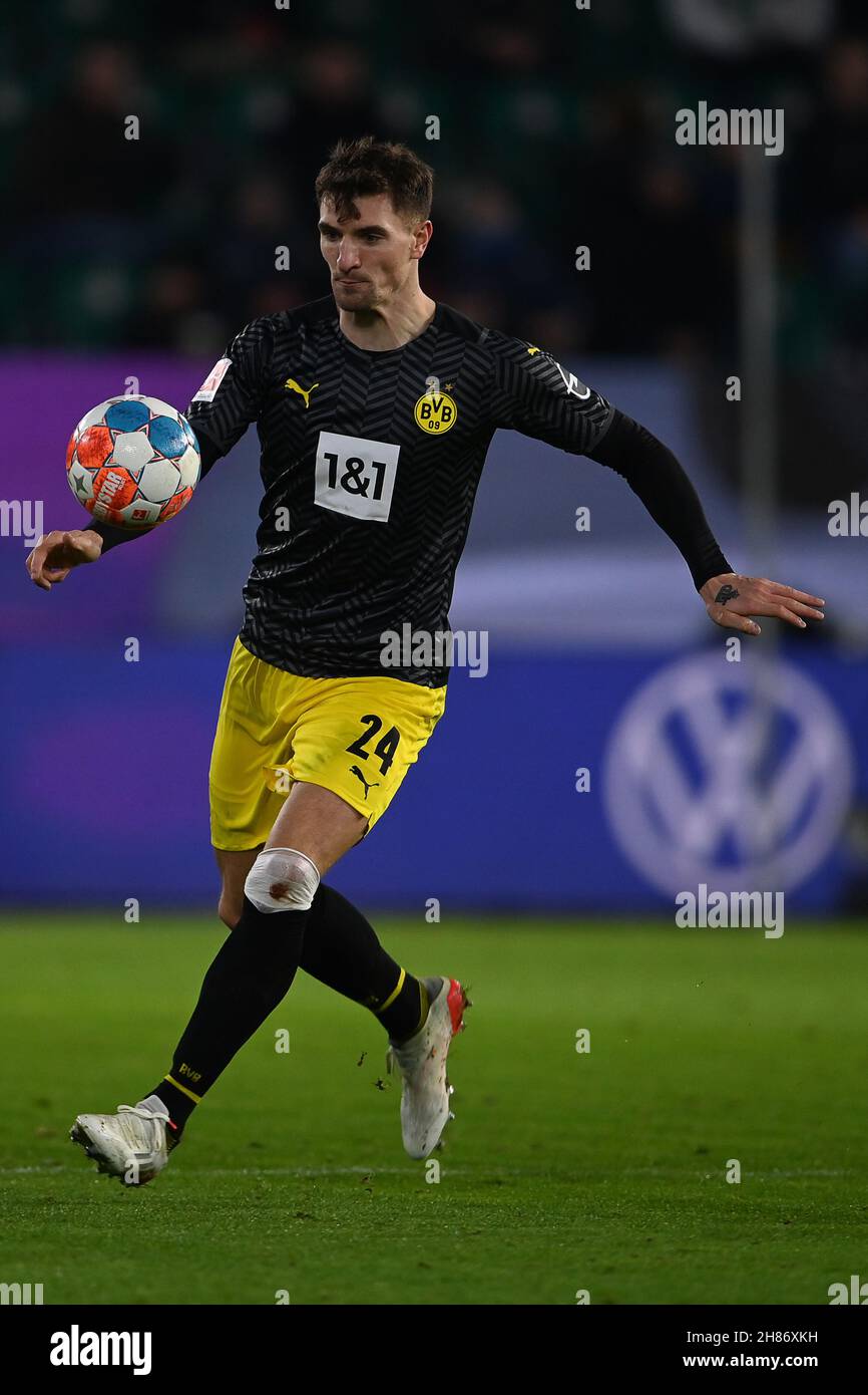 Wolfsburg, Germany. 27th Nov, 2021. Football: Bundesliga, VfL Wolfsburg - Borussia Dortmund, Matchday 13 at Volkswagen Arena. Dortmund's Thomas Meunier plays the ball. Credit: Swen Pförtner/dpa - IMPORTANT NOTE: In accordance with the regulations of the DFL Deutsche Fußball Liga and/or the DFB Deutscher Fußball-Bund, it is prohibited to use or have used photographs taken in the stadium and/or of the match in the form of sequence pictures and/or video-like photo series./dpa/Alamy Live News Stock Photo