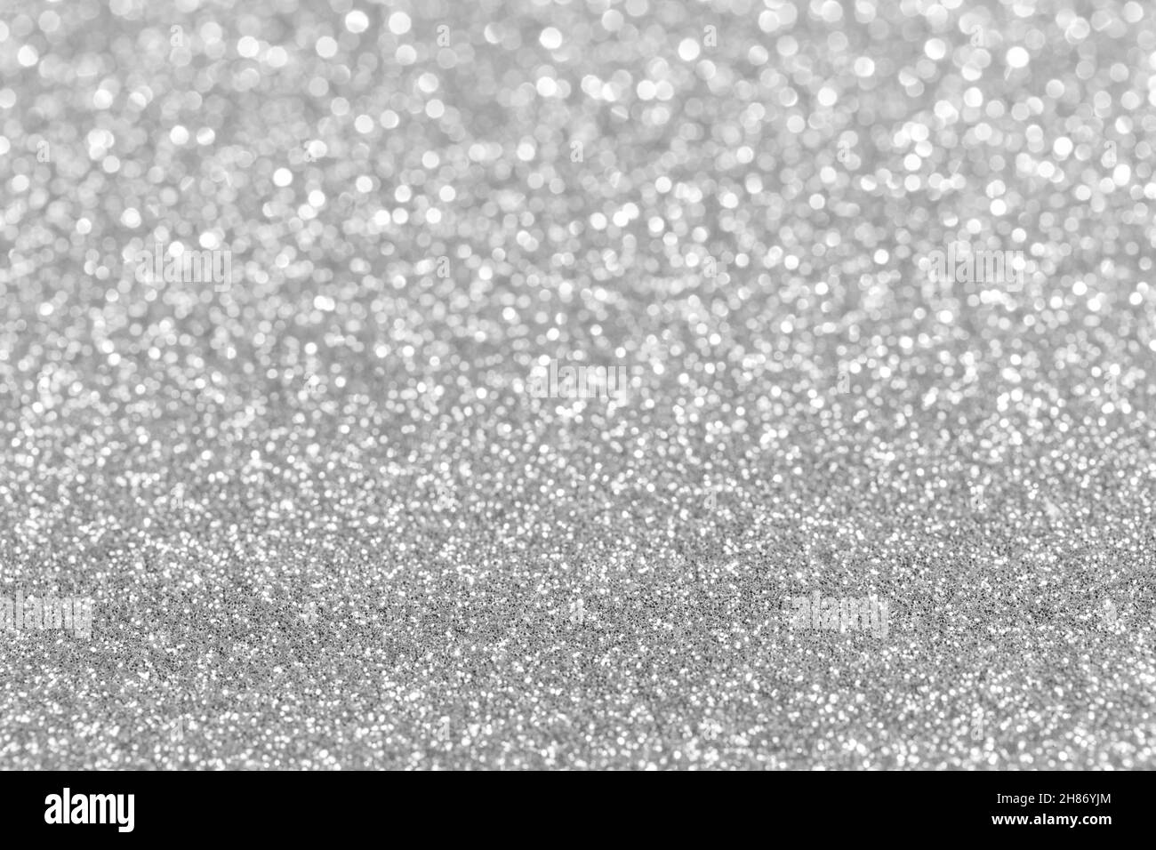 Shiny silver defocused glitter holiday background with copy space Stock ...