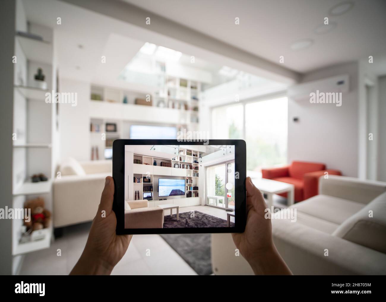 Decorating Apartment with Augmented Reality Interior Design Software. High quality photo Stock Photo