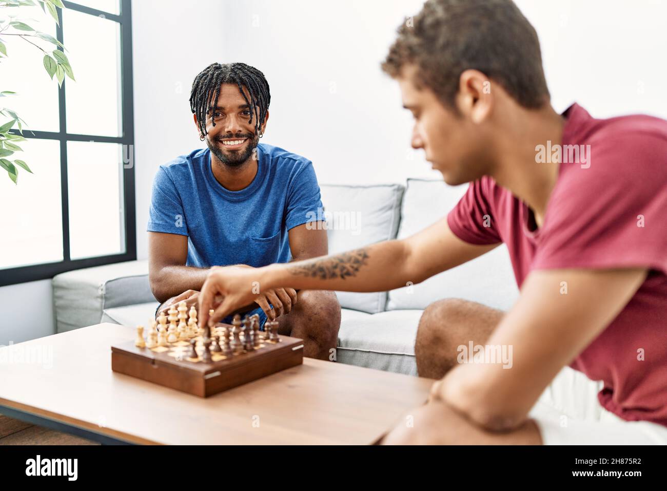 Two friends enjoy chess hi-res stock photography and images - Alamy
