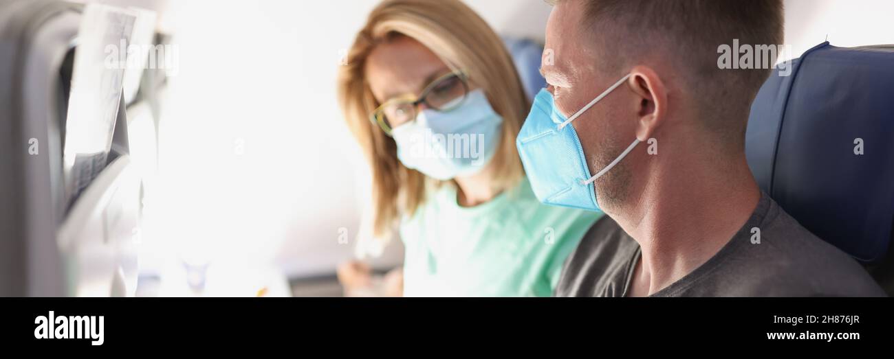 Married couple in medical masks hi-res stock photography and images - Alamy