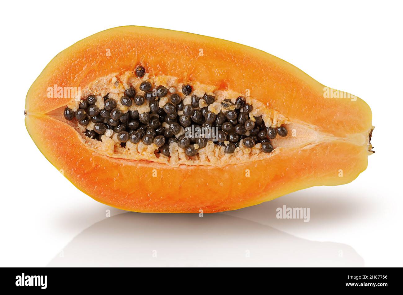 Single half ripe papaya isolated on white background Stock Photo