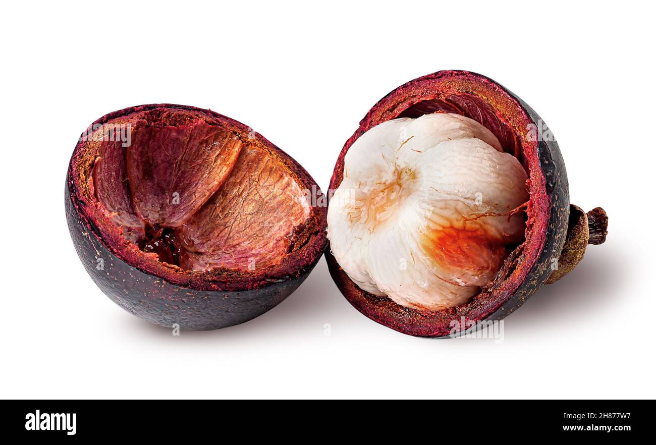 Opened mangosteen and shells near isolated on white background Stock Photo