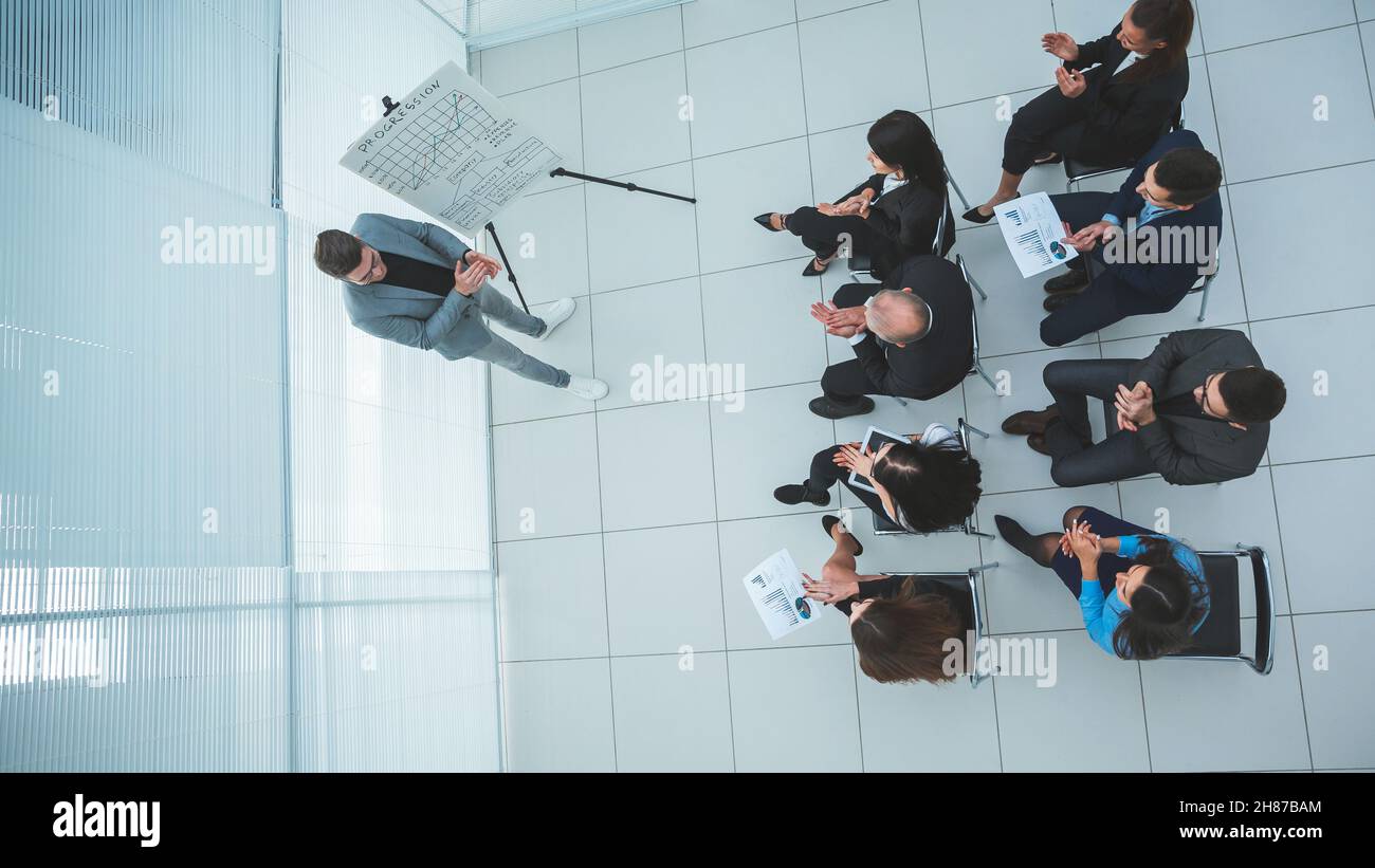 top view. working group discussing working issues at the meeting . Stock Photo