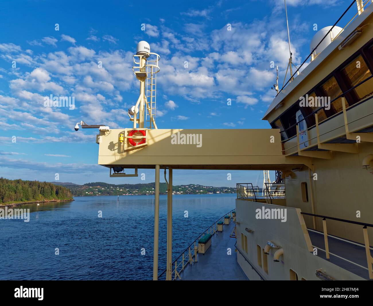 A View of the Port Side Bridge wing of the Ramform Vanguard as it transits up Bergen Fjord on a bright Summers Morning. Stock Photo