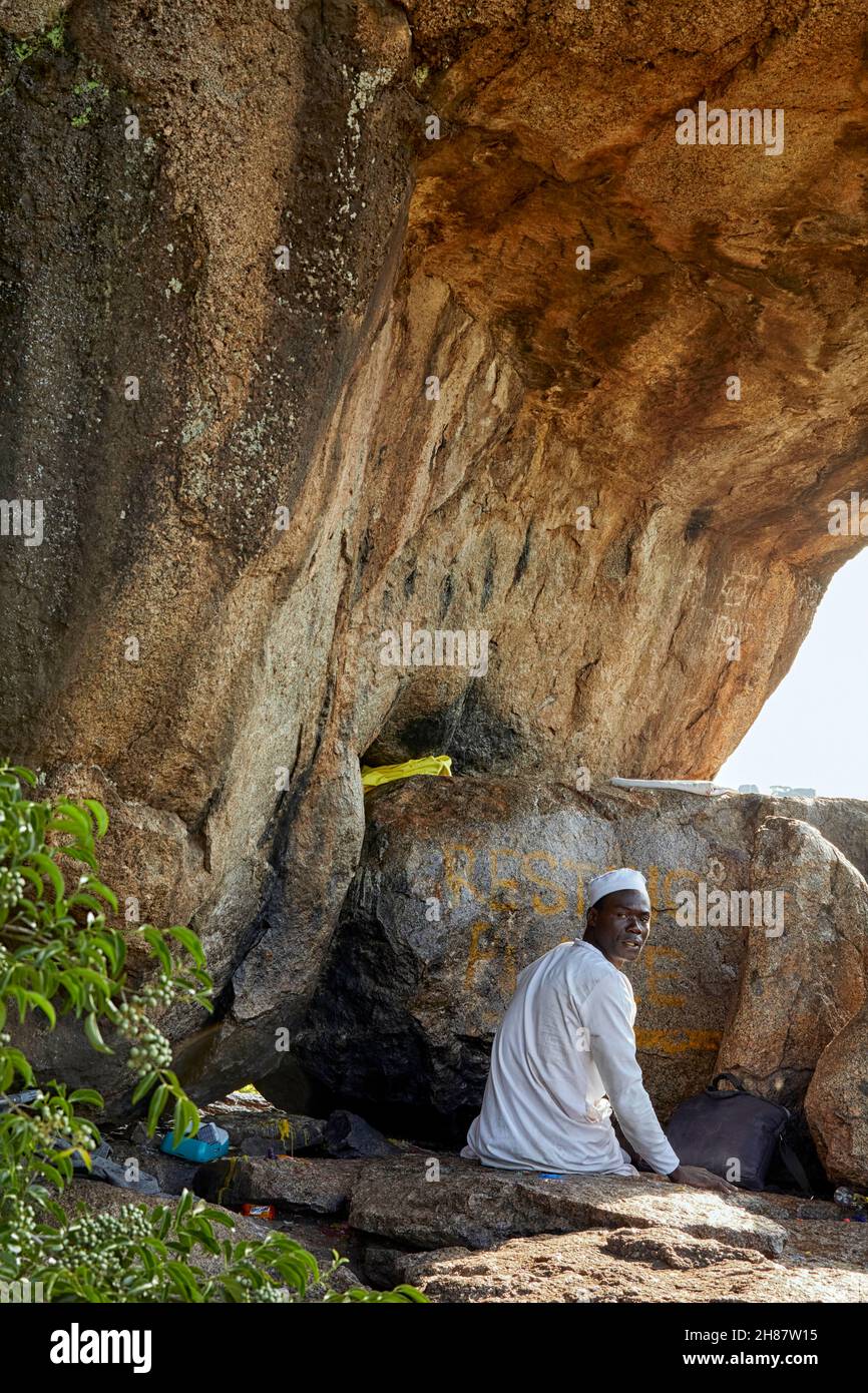 Pilgrim at Kit Mikayi Kitmikayi Kitmikaye rock formation in Kenya, Africa Stock Photo