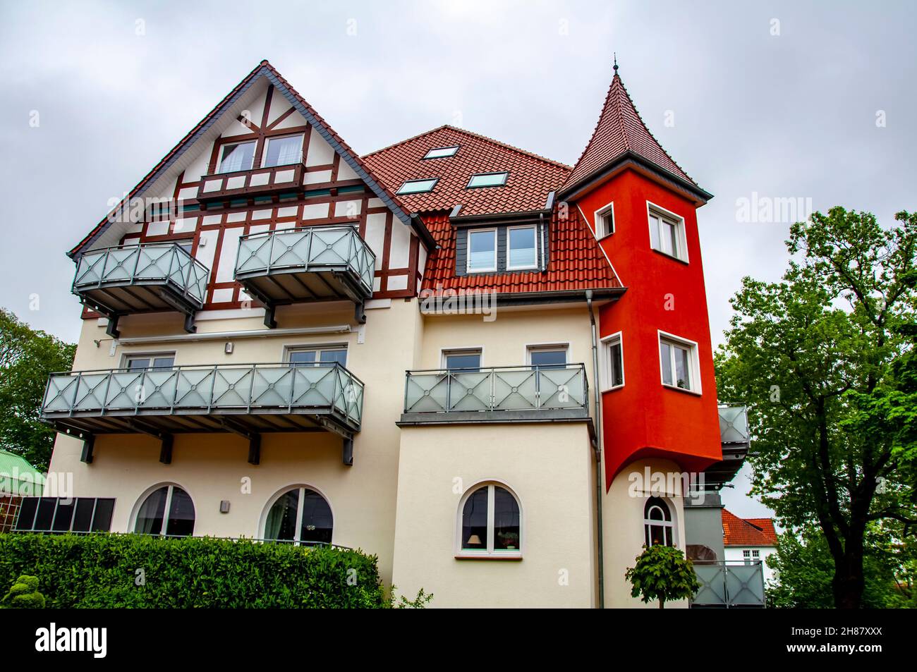 Traditional small house with beautiful outdoor decor facade Stock Photo