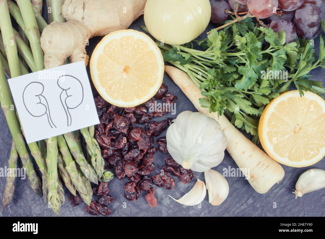 Drawing of kidneys and fresh healthy eating containing natural vitamins