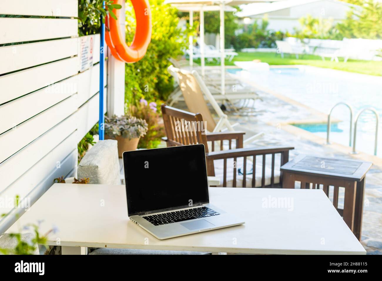 computer on table background as a pool Stock Photo - Alamy