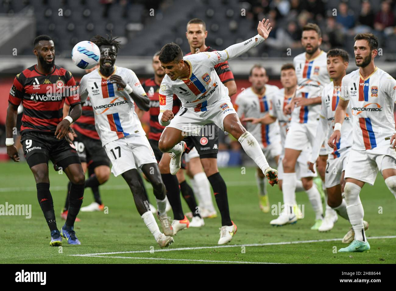 28th November 2021; CommBank Stadium, Parramatta, Western Sydney, Australia ; Australian A-League football, Western Sydney Wanderers versus Newcastle Jets; Valentino Yuel of Newcastle Jets heads away and clears the danger from the corner kick Stock Photo